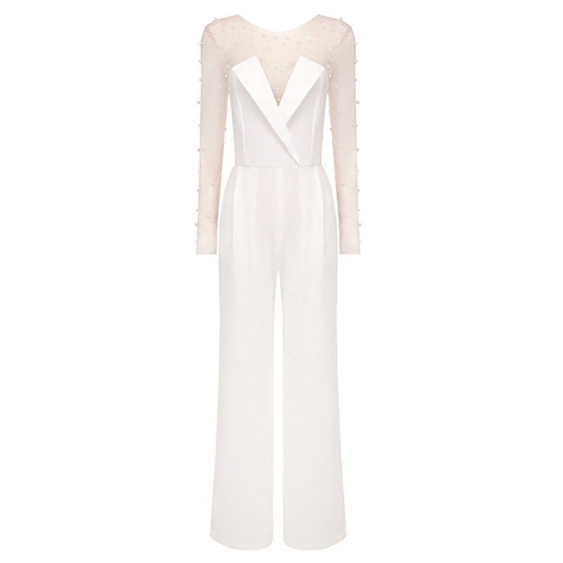 Woman wearing Isabella white jumpsuit with pearl mesh top – front view