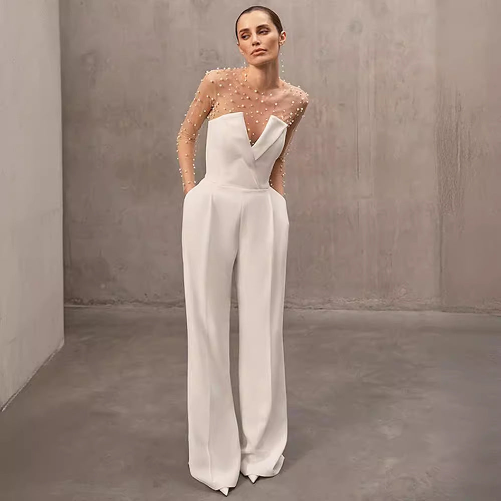 Strapless white tailored jumpsuit with wide-leg pants – elegant minimalist style